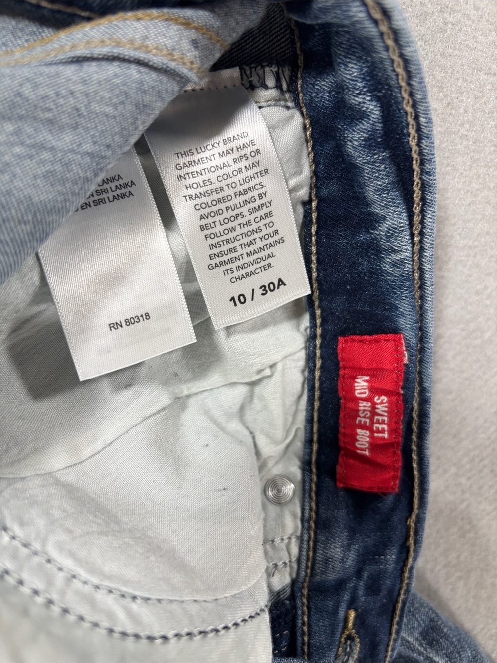 Lucky Brand Blue Flare Jeans with Light Floral Embroidery 10/30 - Picture 4 of 9